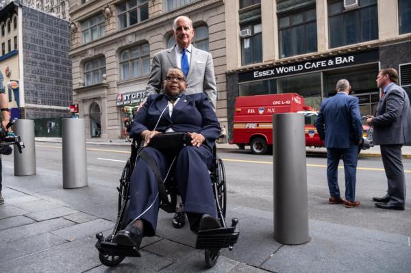 Firefighters attorney and 9/11 victims advocate Nicholas Papain with former NYPD Detective Barbara Burnette.