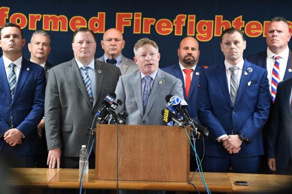 Members of the Uniformed Firefighters Association speak of the numbers of FDNY firefighters who co<em></em>ntinue to get sick and die from 9/11 exposures.